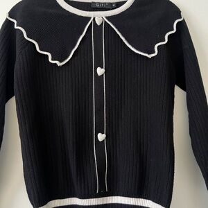 Chic Black Cardigan with White Trim